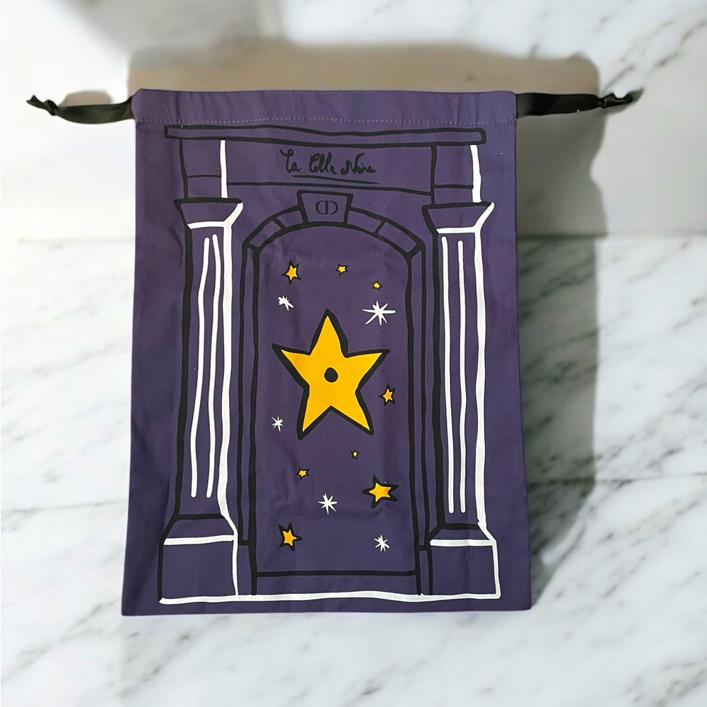 Christian Dior Purple Drawstring Novelty Travel Pouch with Star Design.